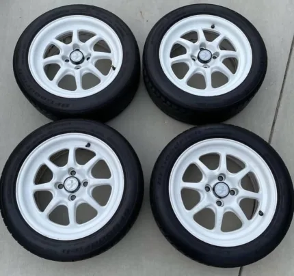 Enkei J-Speeds with hard to find center caps 15x7 +38 offset 4x 100