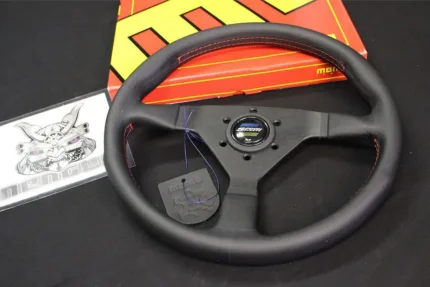 Spoon steering wheel has been co-designed with Momo