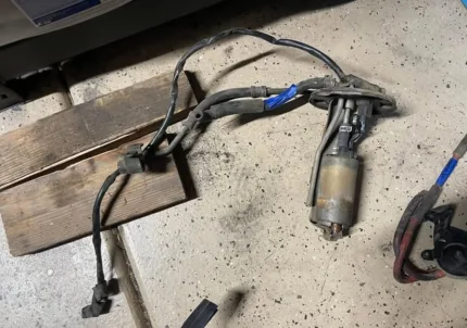 Fuel pump hangar from an 89 Honda Civic wagon.