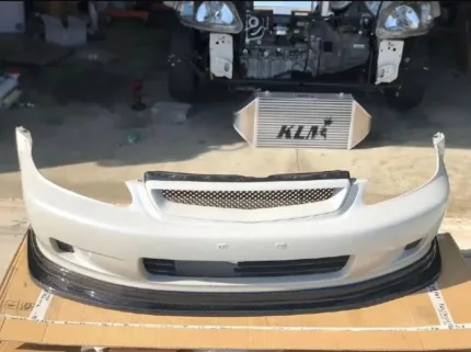 Honda 99-00 OEM Front bumper with Mesh grill and an Authentic Tactical Arts front lip