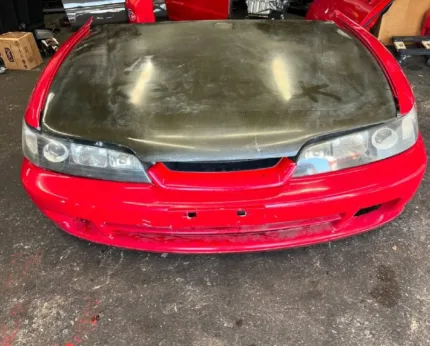 Jdm Integra frontend with HID black housing headlights.