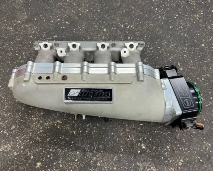 K series skunk2 ultra race manifold with a spacer and a Ross 90mm throttle body