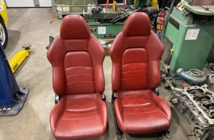 Original red AP2 seats with rails
